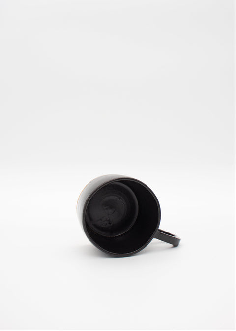 Black ceramic mug by slab ceramics