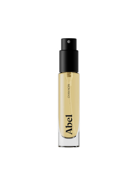 Abel Cyan Nori perfume bottle with black cap on a white background