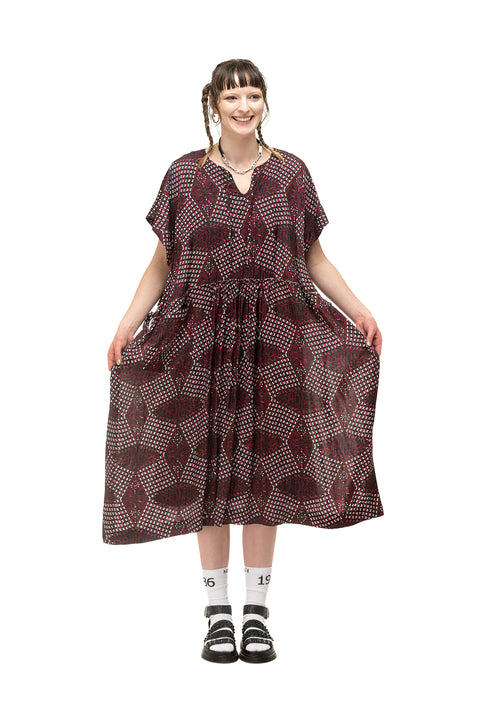 NomD Painter Smock dress in red black and white beady print. 